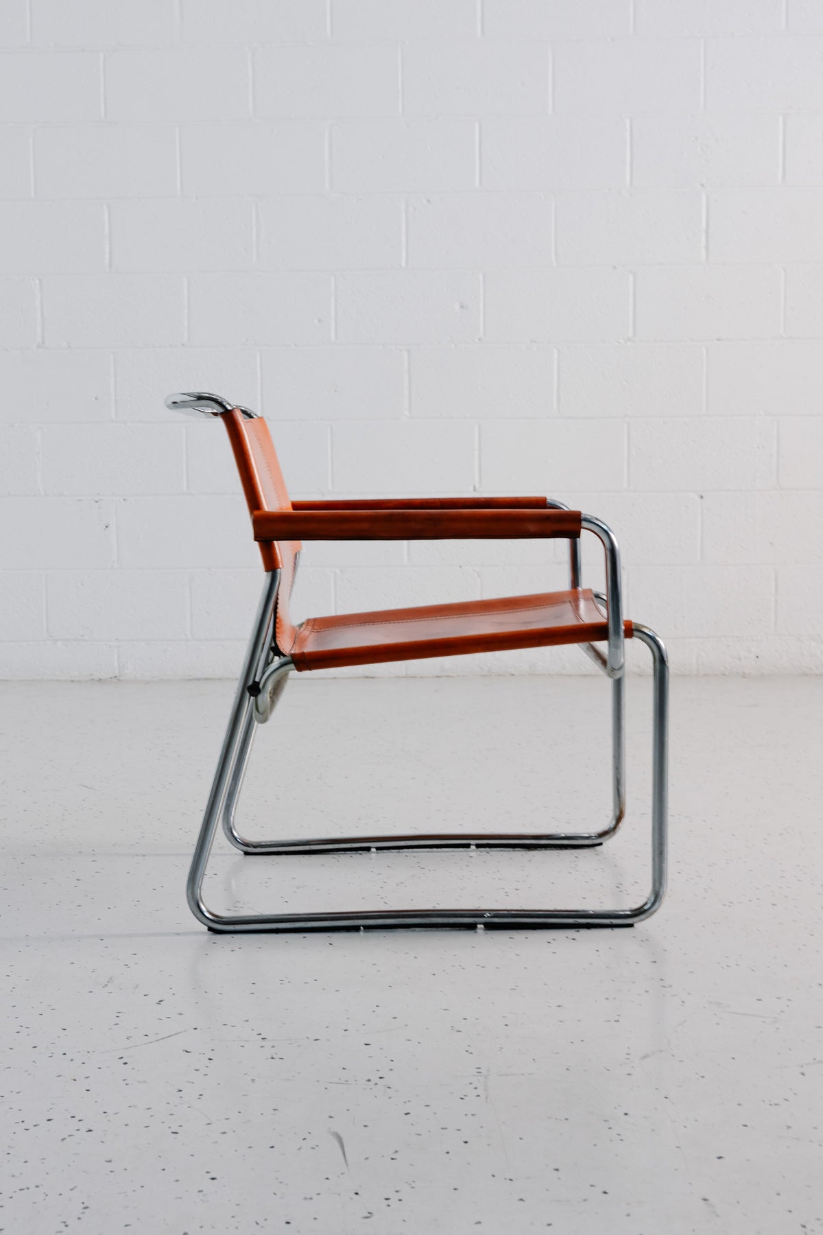 Italian Leather Saddle Chair