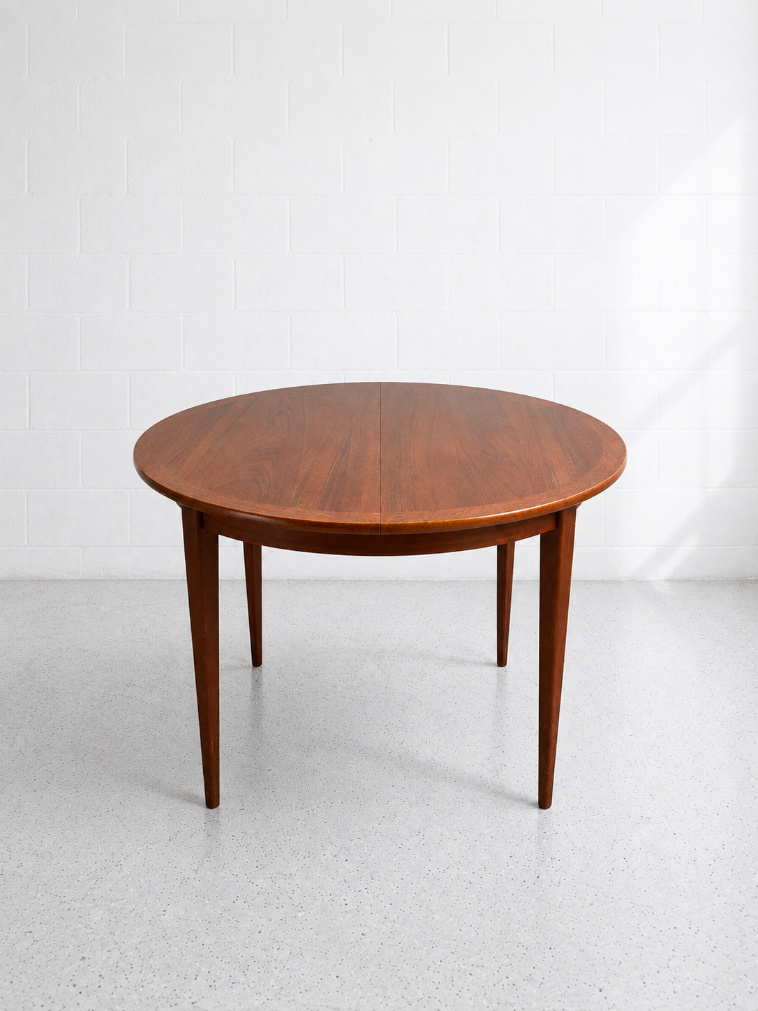 Round-to-Oval Extension Dining Table