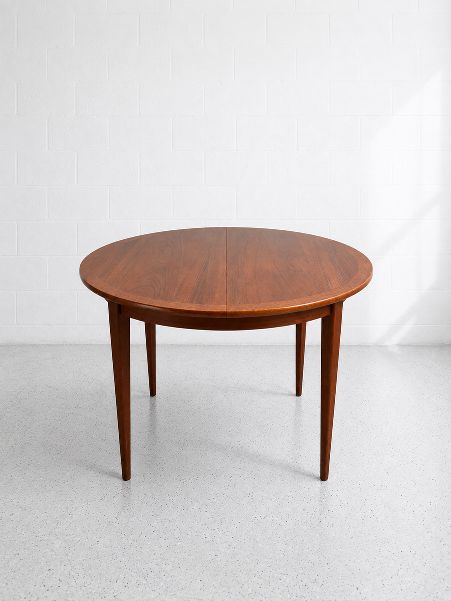 Round-to-Oval Extension Dining Table